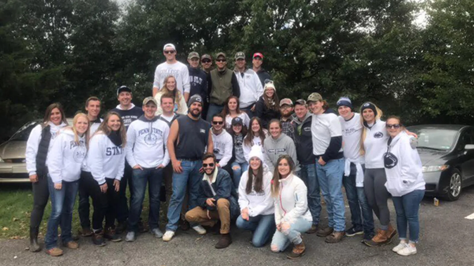 TPS Fellow Cullen Dixon with a group of friends at Penn State University