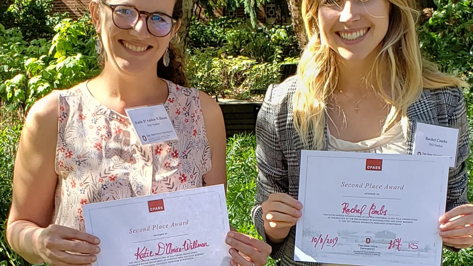 TPS Fellows Katie D'Amico-Willman and Rachel Combs hold their certificates after placing second in the Horticulture and Crop Science Graduate Research Symposium.
